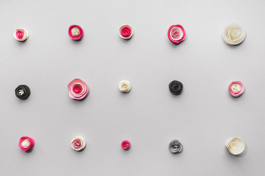 Variety of paper flowers in columns and rows