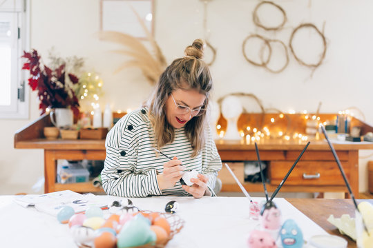 Woman preparing easter in the workshop
