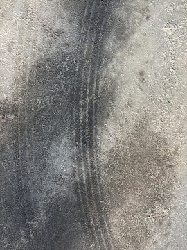 tire marks on asphalt