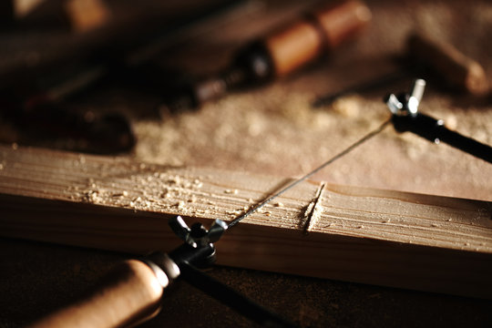 Scroll saw cutting wood