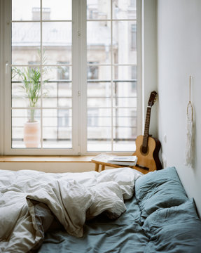 Bed in stylish bedroom