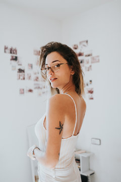 Portrait of woman with graduated glasses