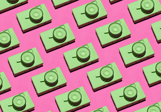 Green film cameras pattern on pink/magenta background
