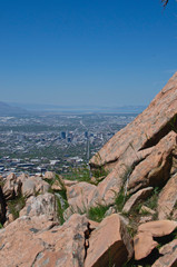 Red rock cliffs above the salt lake city valley under the morning light. 