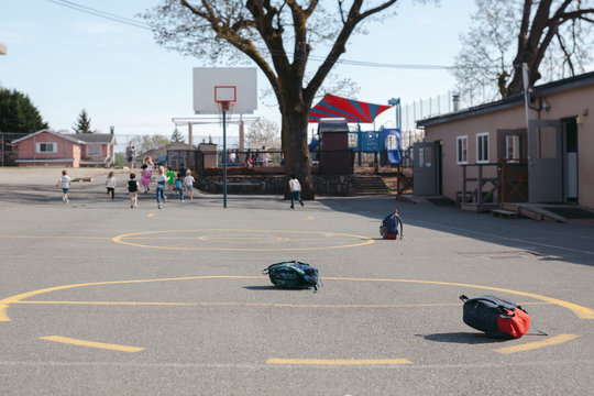 Running preschool kids outside
