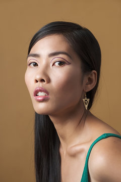 Close Up Of Asian Woman Wearing Trendy Makeup