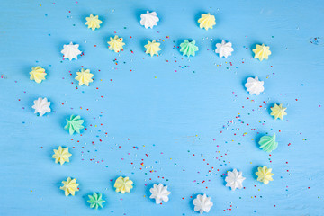 Meringue on a blue  wooden background