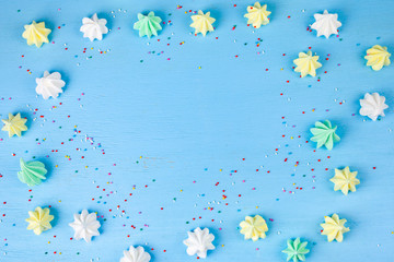 Meringue on a blue  wooden background