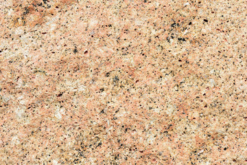 Texture of rocks on the seashore close-up. Natural stone background