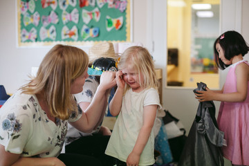 Teacher consoling upset student