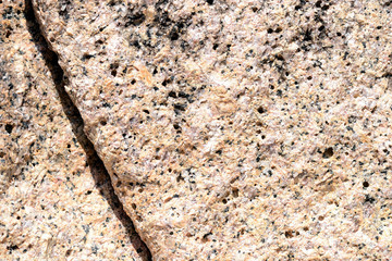 Texture of rocks on the seashore close-up. Natural stone background