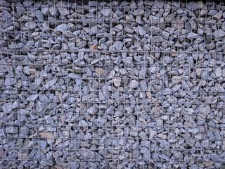 wall of small stones, stones in the grid
