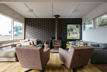 Beach house living room with a cosy fire