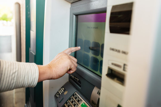 person using atm