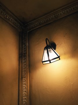 Light on an ornate wall