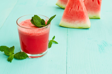Watermelon drink and mint in a glass. A refreshing summer cocktail.