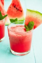 Watermelon drink and mint in a glass. A refreshing summer cocktail.