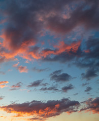 Beautiful clouds at sunset as background