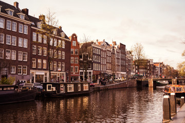 Fototapeta na wymiar Traditional old buildings and canal in Amsterdam, Netherlands