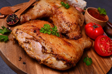 Roasted chicken legs with spices and vegetables