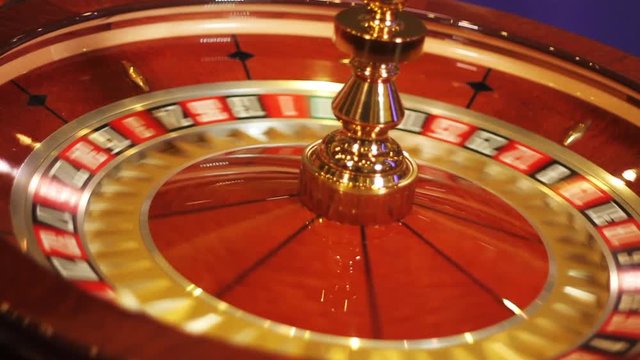 Close up, slow motion roulette wheel