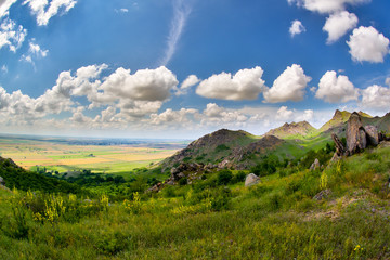 mountain landscape with beautiful sky in Dobrogea, Romania