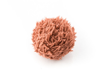 Pink fluffy ball isolated on white background