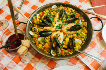 Traditional Spanish paella with shrimps and mussels served in a café in Puerto de la Cruz or Crossport in the est of the island of Tenerife in the Canary Islands