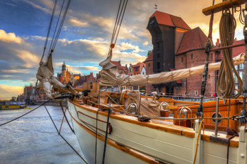 Beautiful port crane and the old town of Gdansk at sunset, Poland.