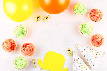 Colorful birthday party accessories on white. Wrapped gifts, confetti, balloons, party hats, decorations, copy space