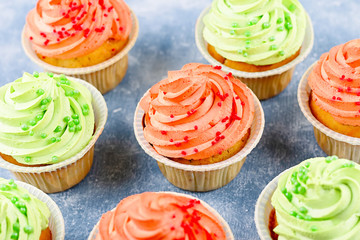 Tasty colorful cupcakes closeup with copy space. Birthday party sweets. Happy birthday greeting card