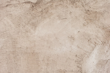 Texture of a concrete wall with cracks and scratches which can be used as a background