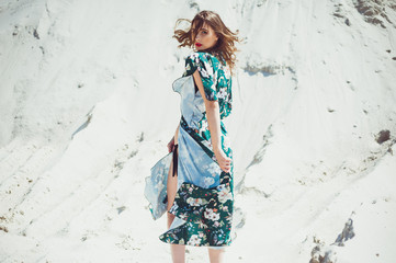 Beautiful woman summer swimwear on the sand 