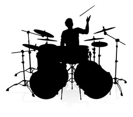 A drummer musician drumming drums in detailed silhouette