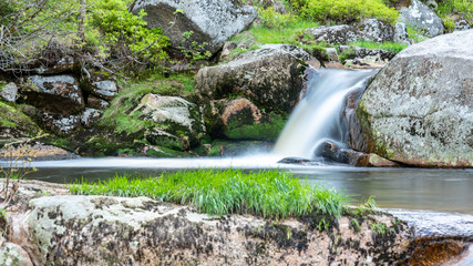 Mountain rocky river flow. Long exposure shot