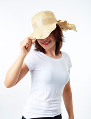 asian woman wearing summer straw hat