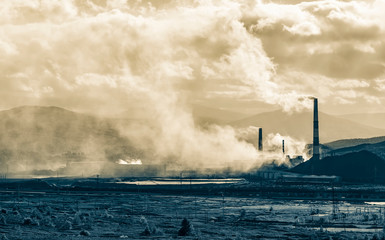 Fototapeta na wymiar Industrial landscape. From pipe factory smoke, polluting the atmosphere. HDR image