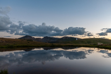 Cars at the top of the independence pass in Colorado.