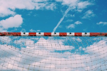 soccer goal and rope net  in the field in the street © Ismael
