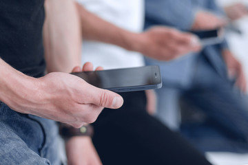 close up.a group of young people with smartphones