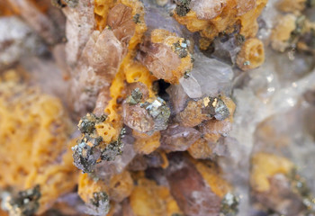 Mineral, yellow calcite and pyrite close up