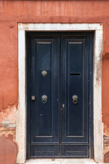Old beautiful door in the Venetian style