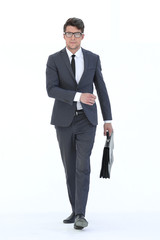 confident businessman with leather briefcase goes forward
