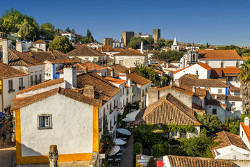 View of Obidos, Portugal. A small town surrounded by medieval castle walls. Popular touristic destination near Lisbon.