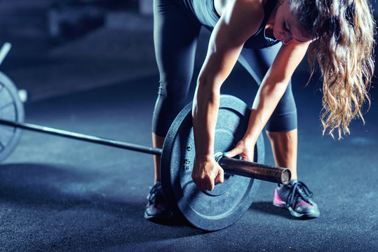 Woman weightlifting on training