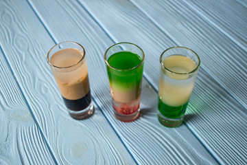 The alcohol shots on a table.