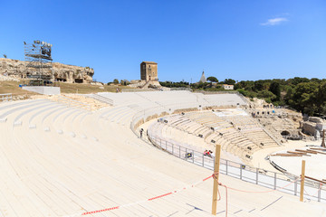 Panoramic view of Teatro Greco, Greek amphitheater in Siracusa, spring sunny day