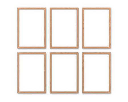 Set of 6 vertical wooden frames mockup with a border hanging on the wall. Empty base for picture or text. 3D rendering.