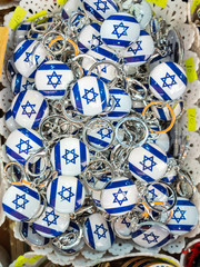 Israeli flags keychains or trinkets for sale at street market. Israel