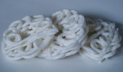 Kerupuk, Indonesian traditional crackers, on white background.